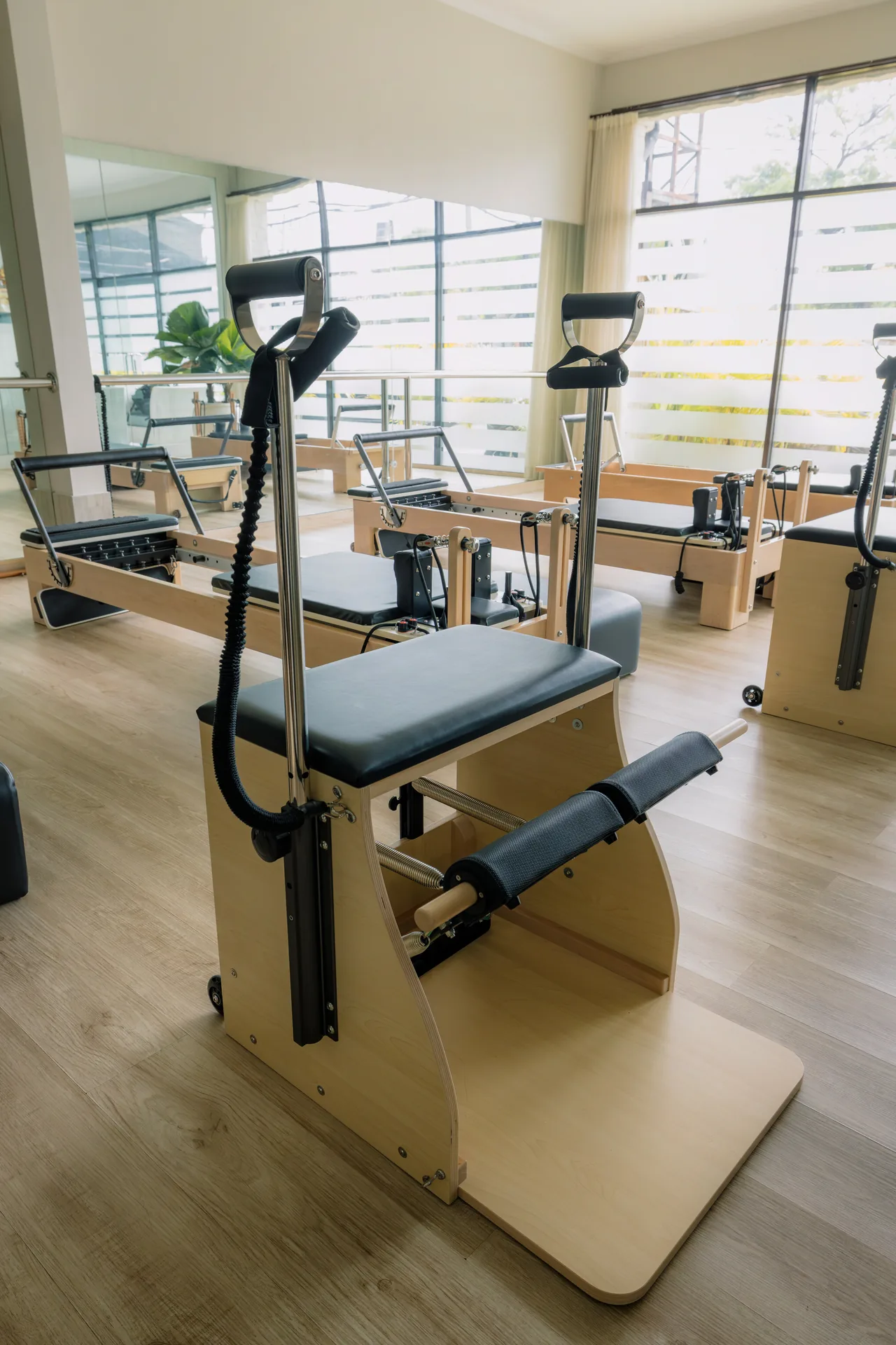 Close-up detail of studio Pilates apparatus and springs